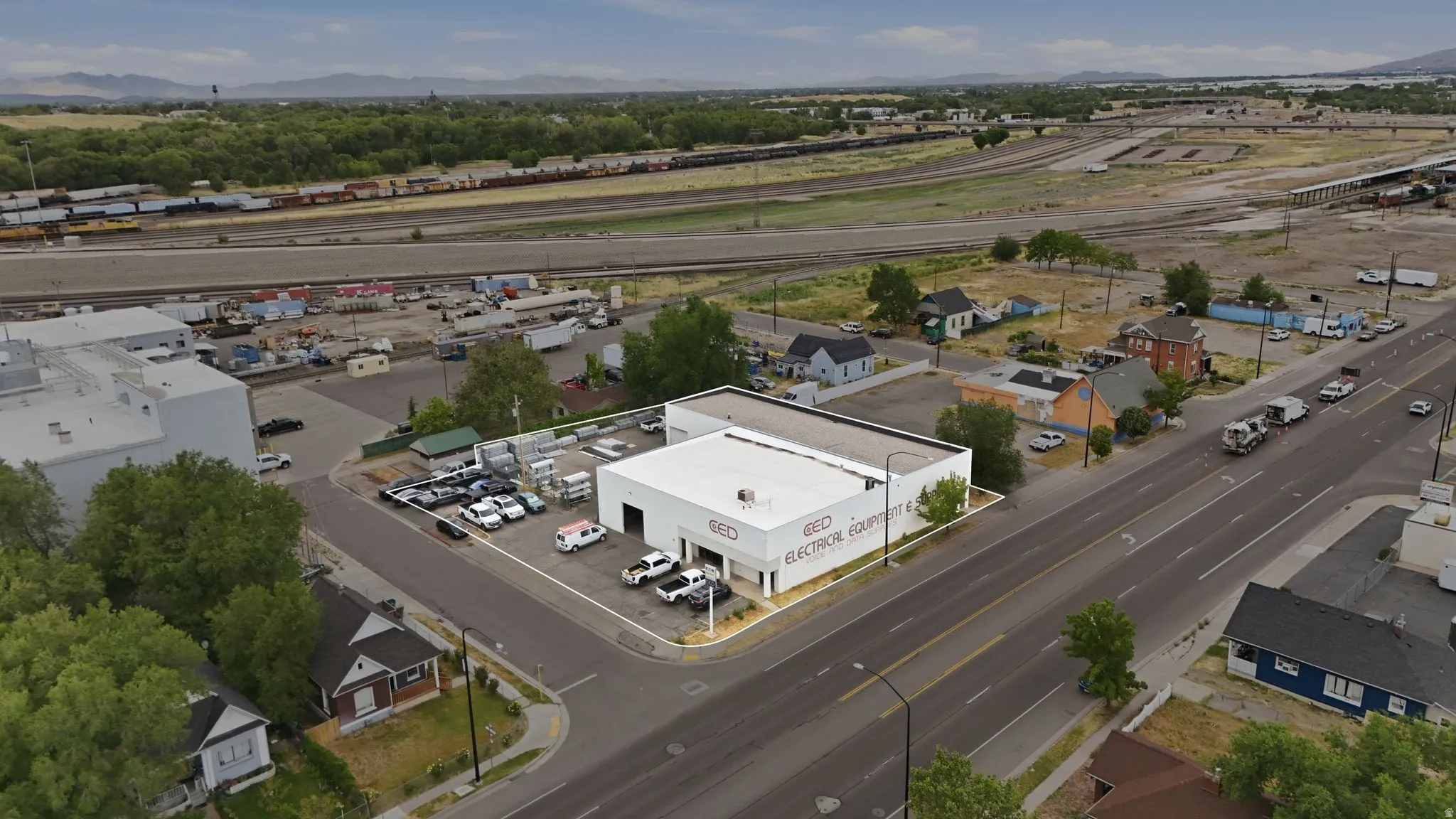 Commercial building with street frontage, on-site parking lot, and prominent signage