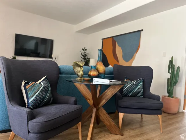 White walls complement the wood-finish flooring