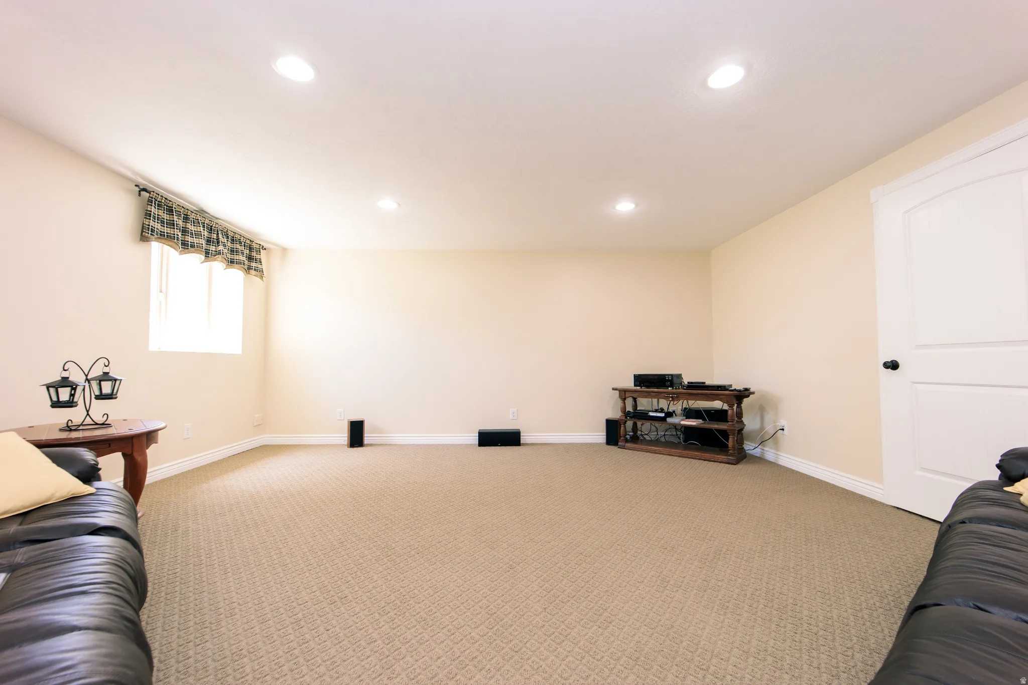 Theatre Room, featuring neutral carpeting, light-toned walls, and recessed lighting