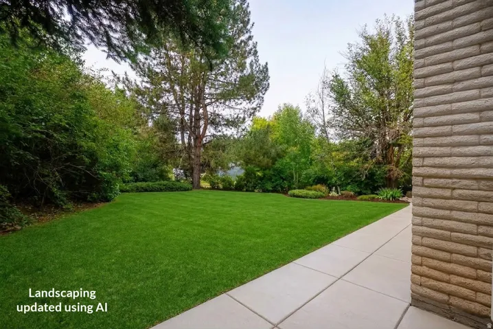 Expansive lawn area with mature trees and established landscaping