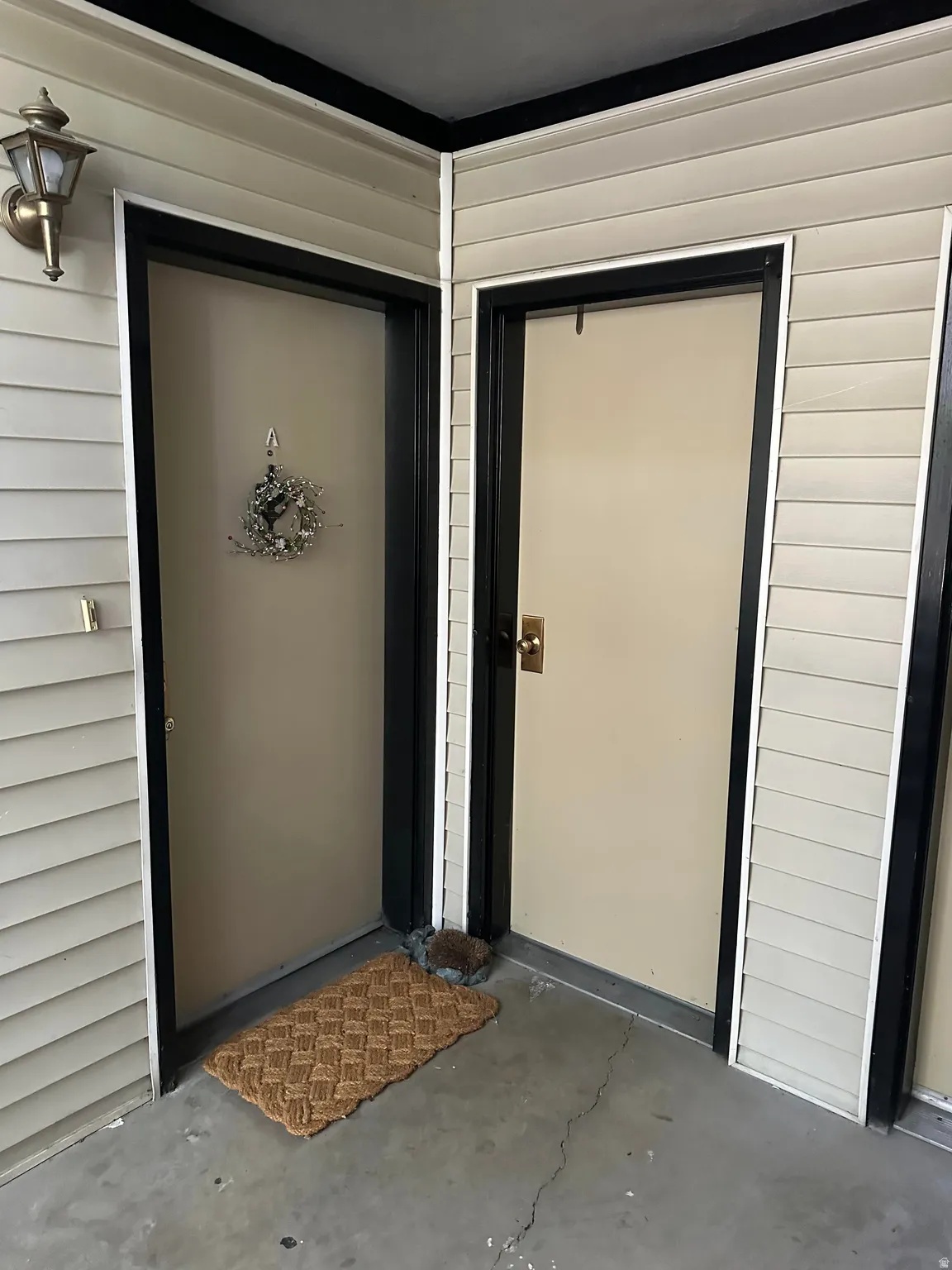 Front door and access to the laundry room, furnace and water heater.