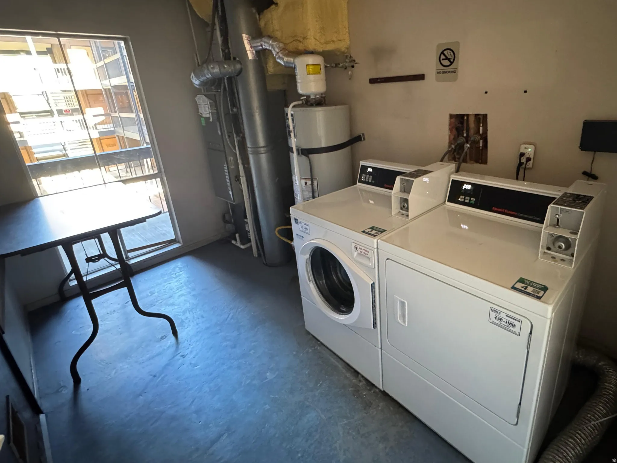 Dedicated laundry area featuring a washer and dryer