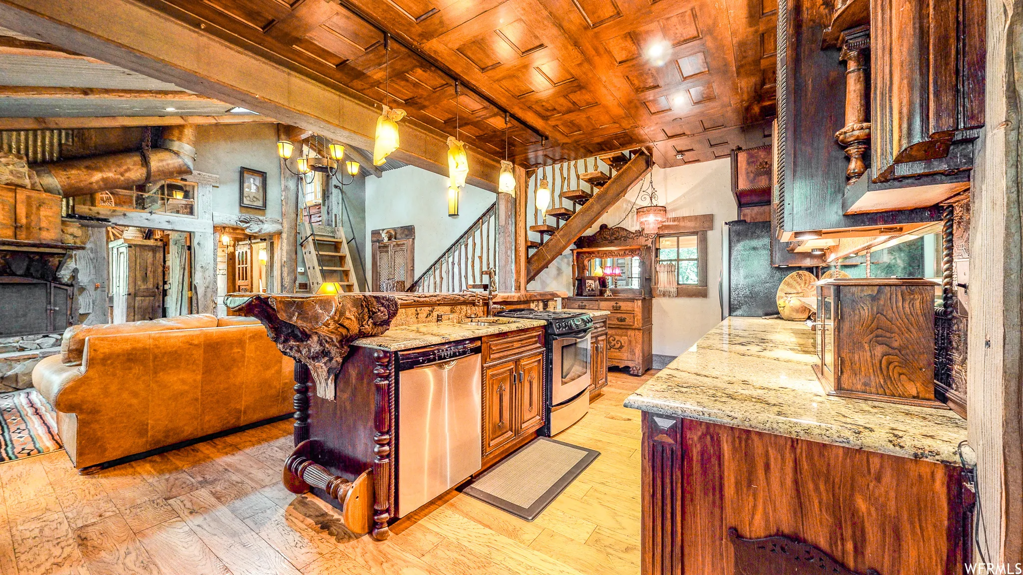 Kitchen featuring wood-finish cabinetry and granite countertops
