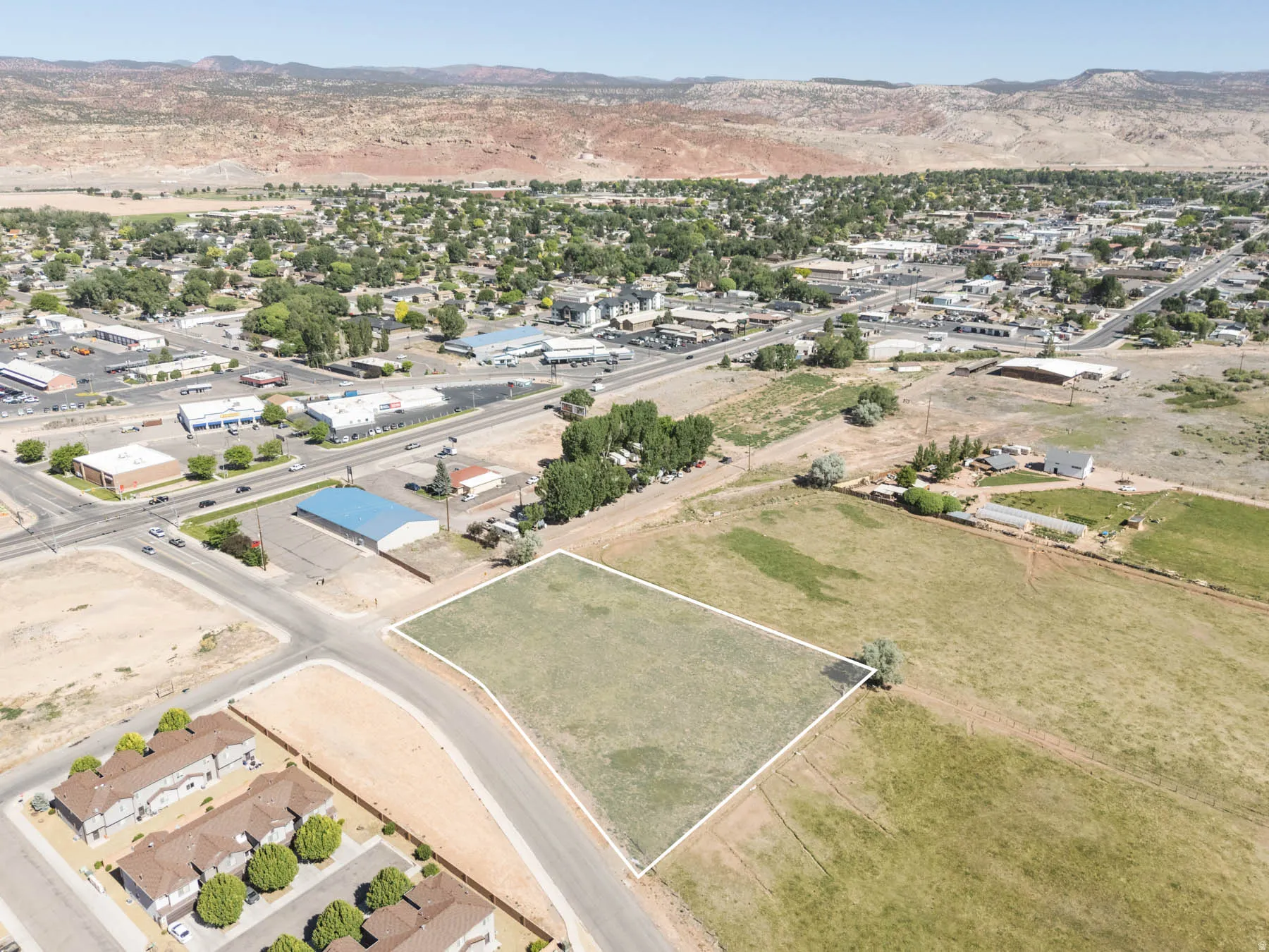 Expansive undeveloped lot featuring a defined perimeter, street frontage, and level topography