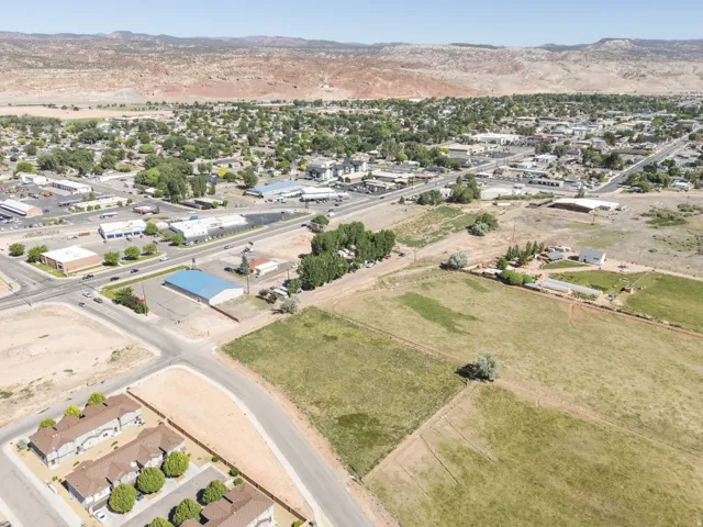 Expansive aerial view showcasing a large undeveloped parcel of land