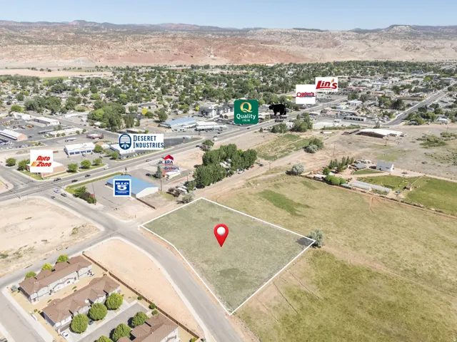 Expansive land parcel featuring clear boundaries and existing road frontage