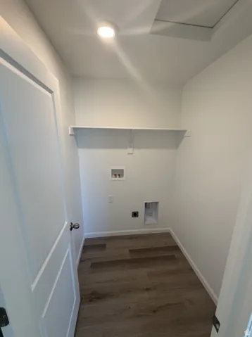 Wood-finish flooring with crisp white baseboards