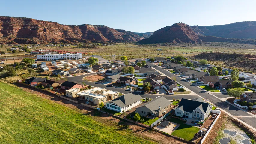 Residential development featuring paved streets and varied architectural styles