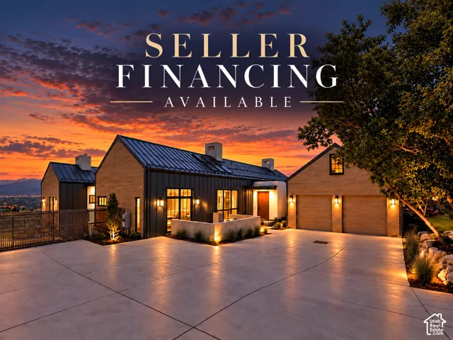 Contemporary exterior featuring vertical metal siding, wood-finish paneling, standing seam metal roofing, integrated wall-mounted lighting, and a concrete driveway