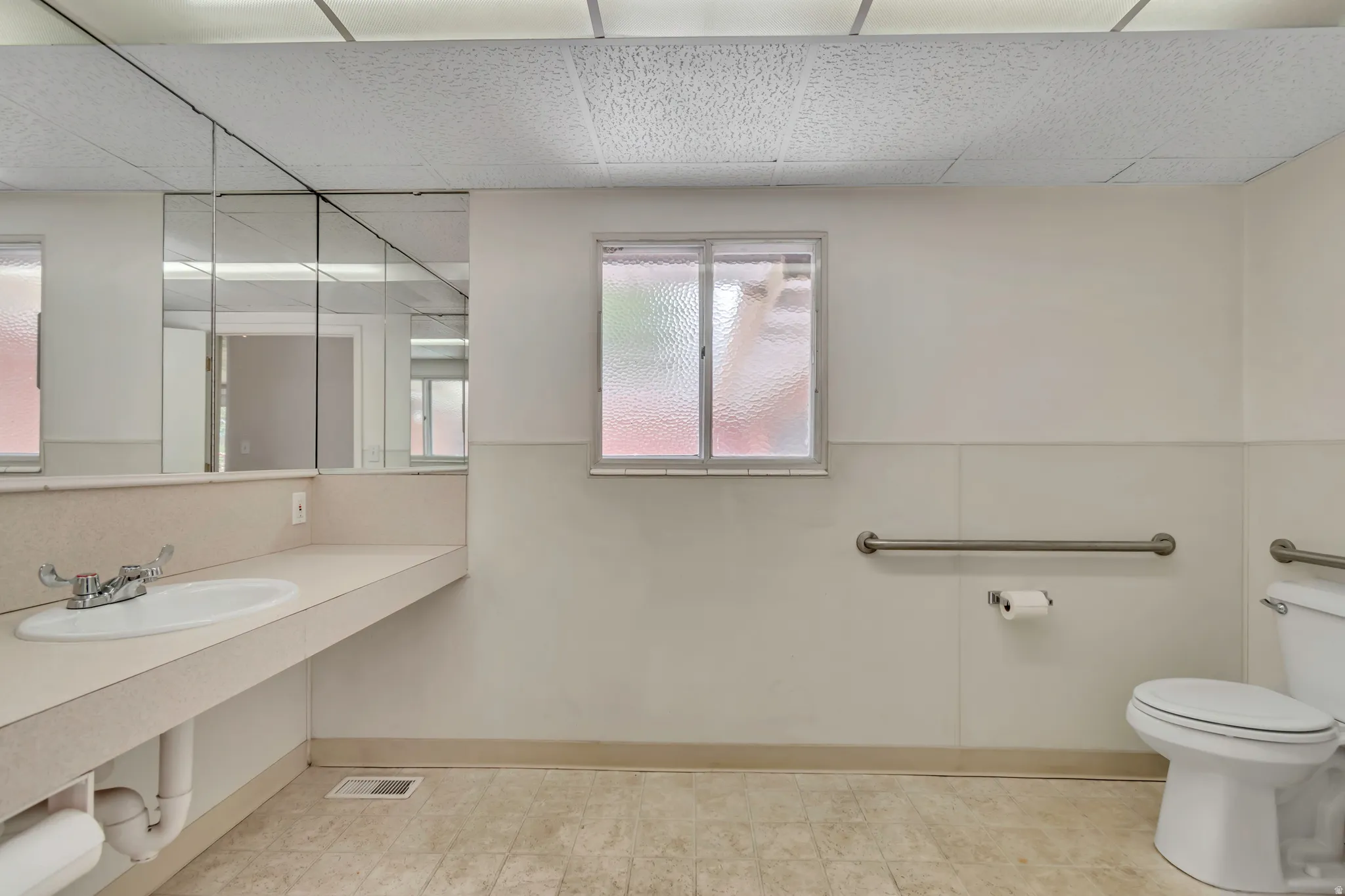 ADA accessible hall bath.