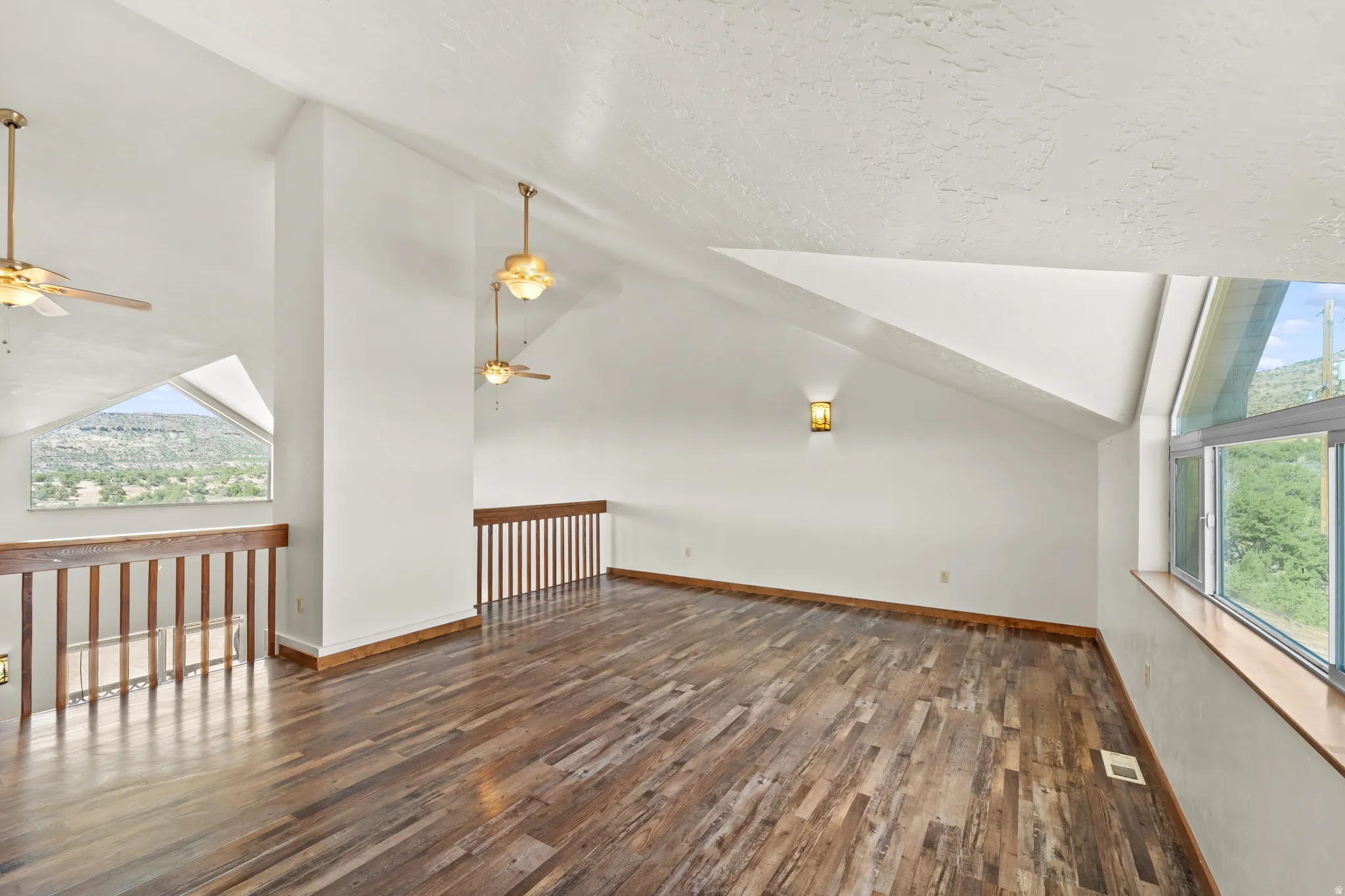 The large loft has amazing views from the huge window. It's just over 300 sq feet with so much potential.