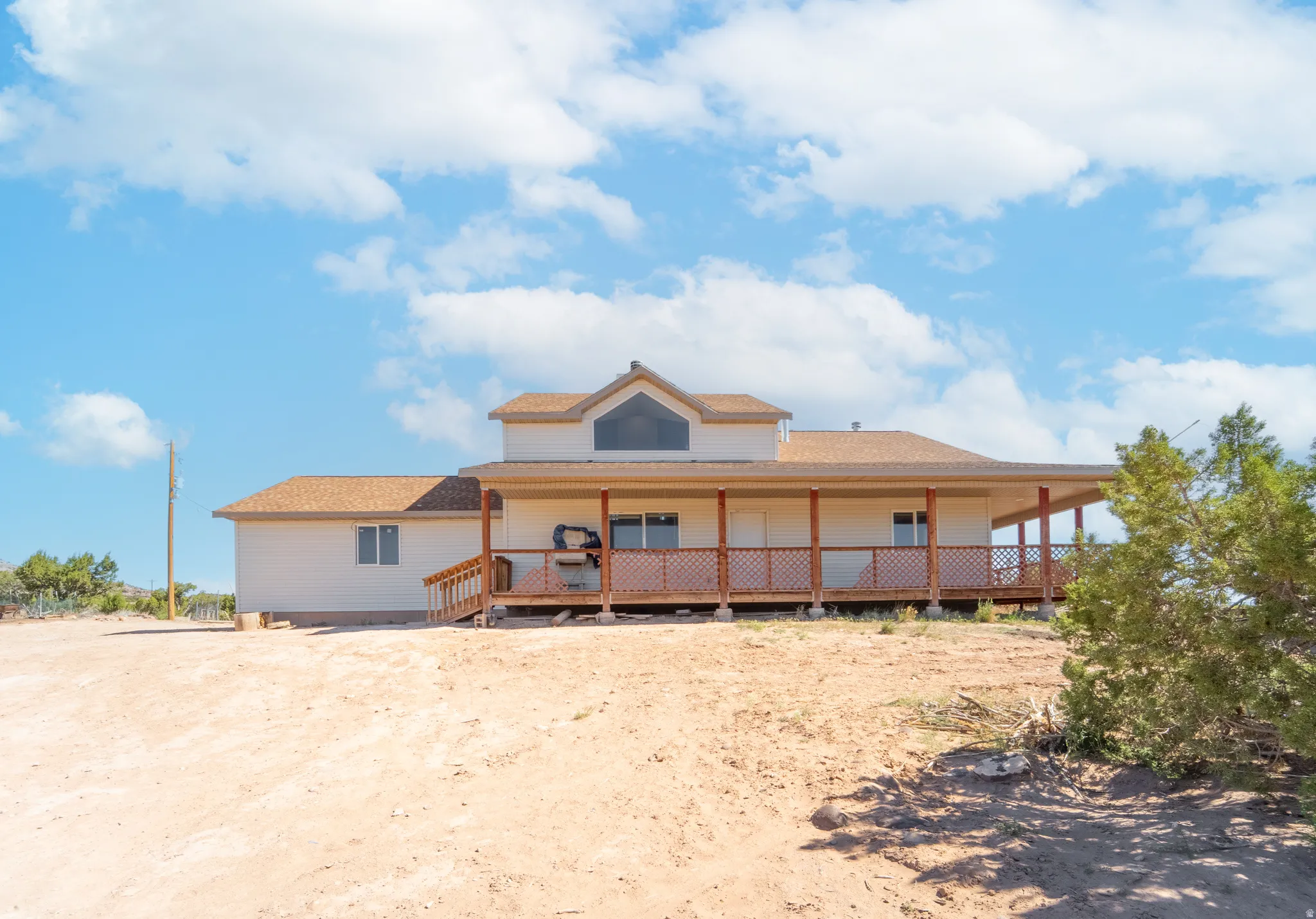 This is a view of the front of the house with the front door.