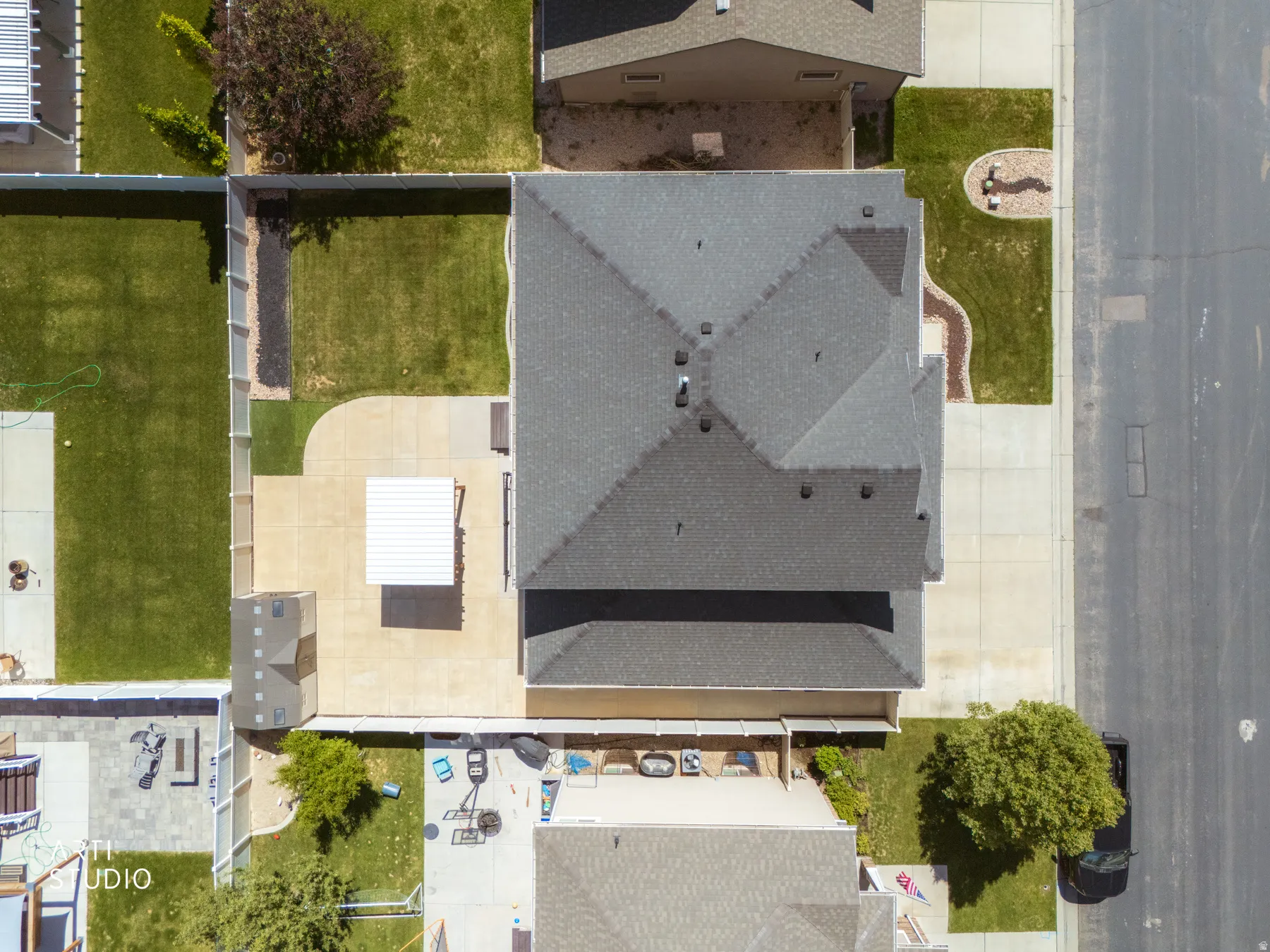 Aerial perspective showcasing a comprehensive property layout with a multi-gabled roofline