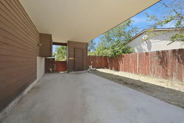 Concrete patio with a covered ceiling