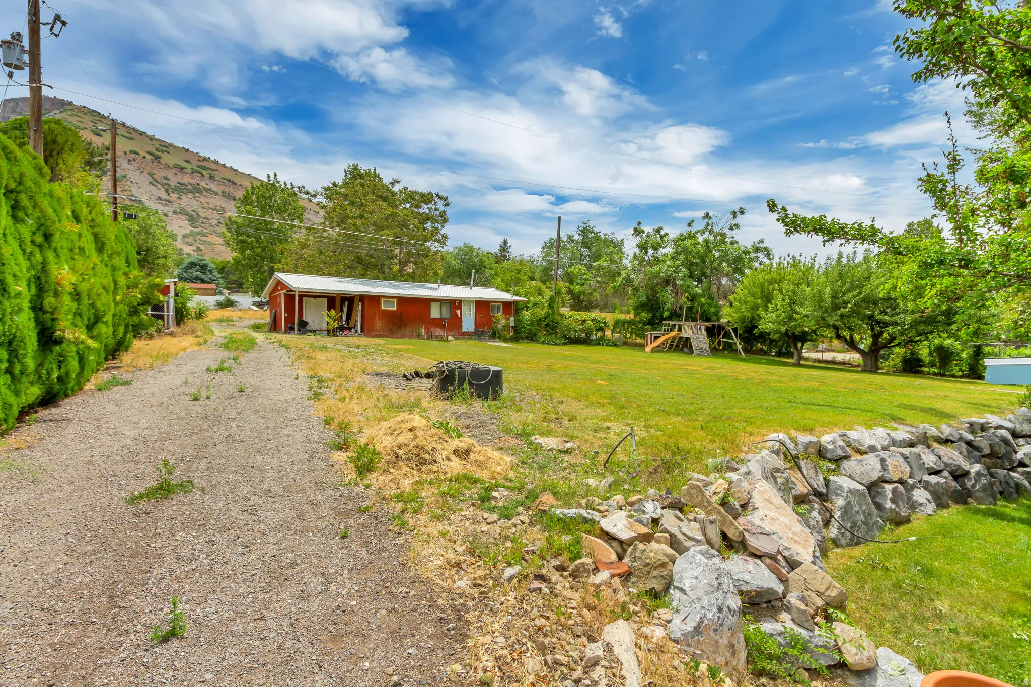 CASITA: gravel driveway up to casita behind main home