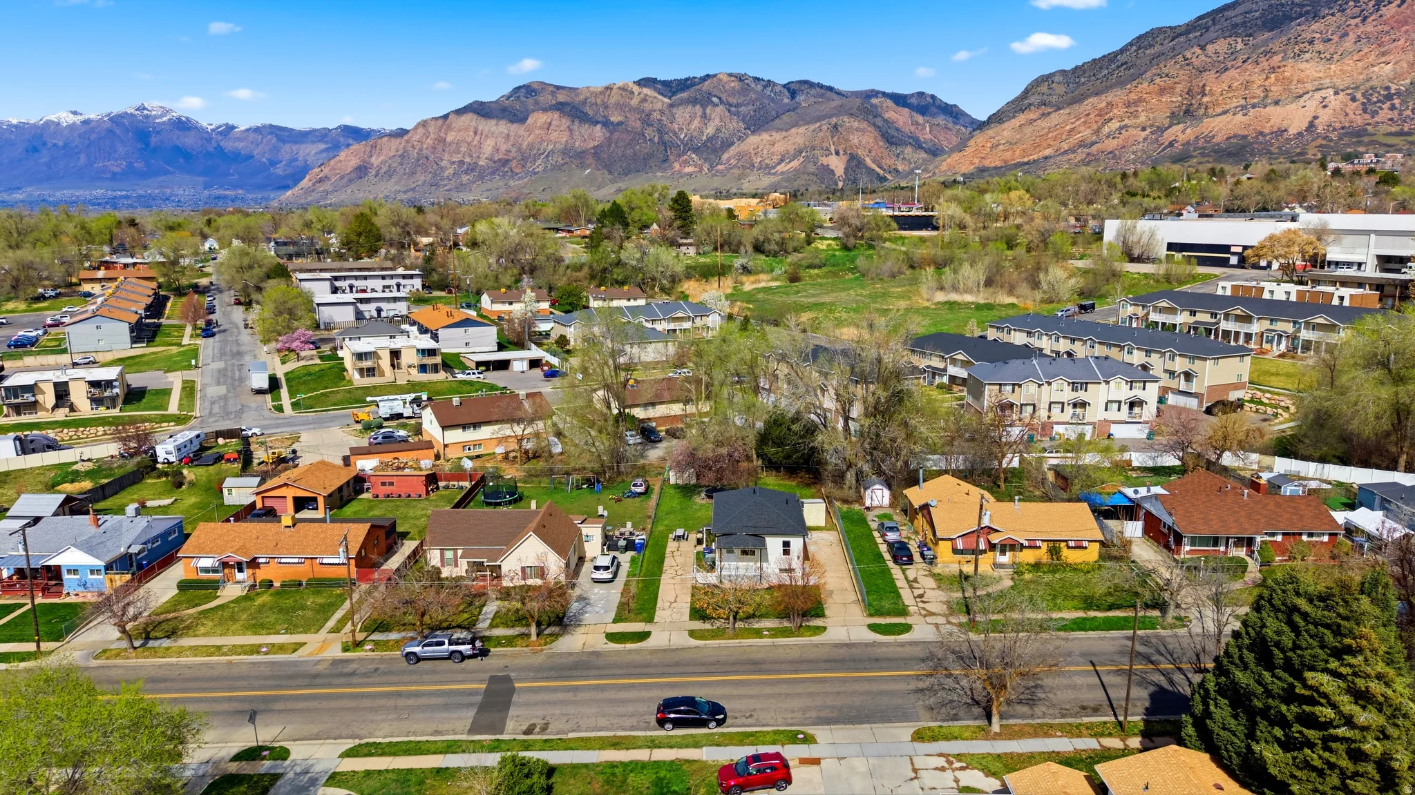 Aerial view of residential area with a mountain backdrop