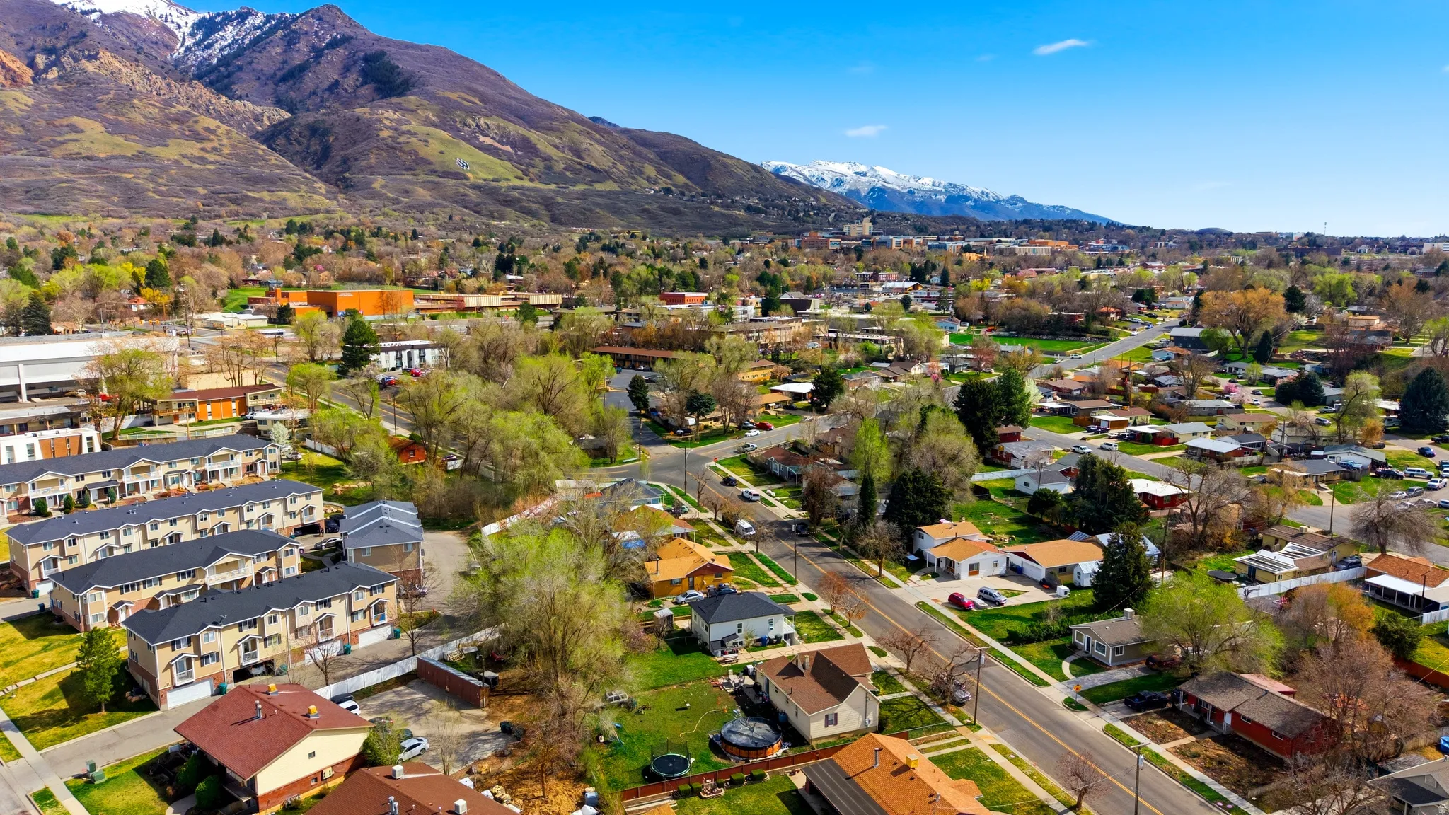 Aerial view of residential area with mountains
