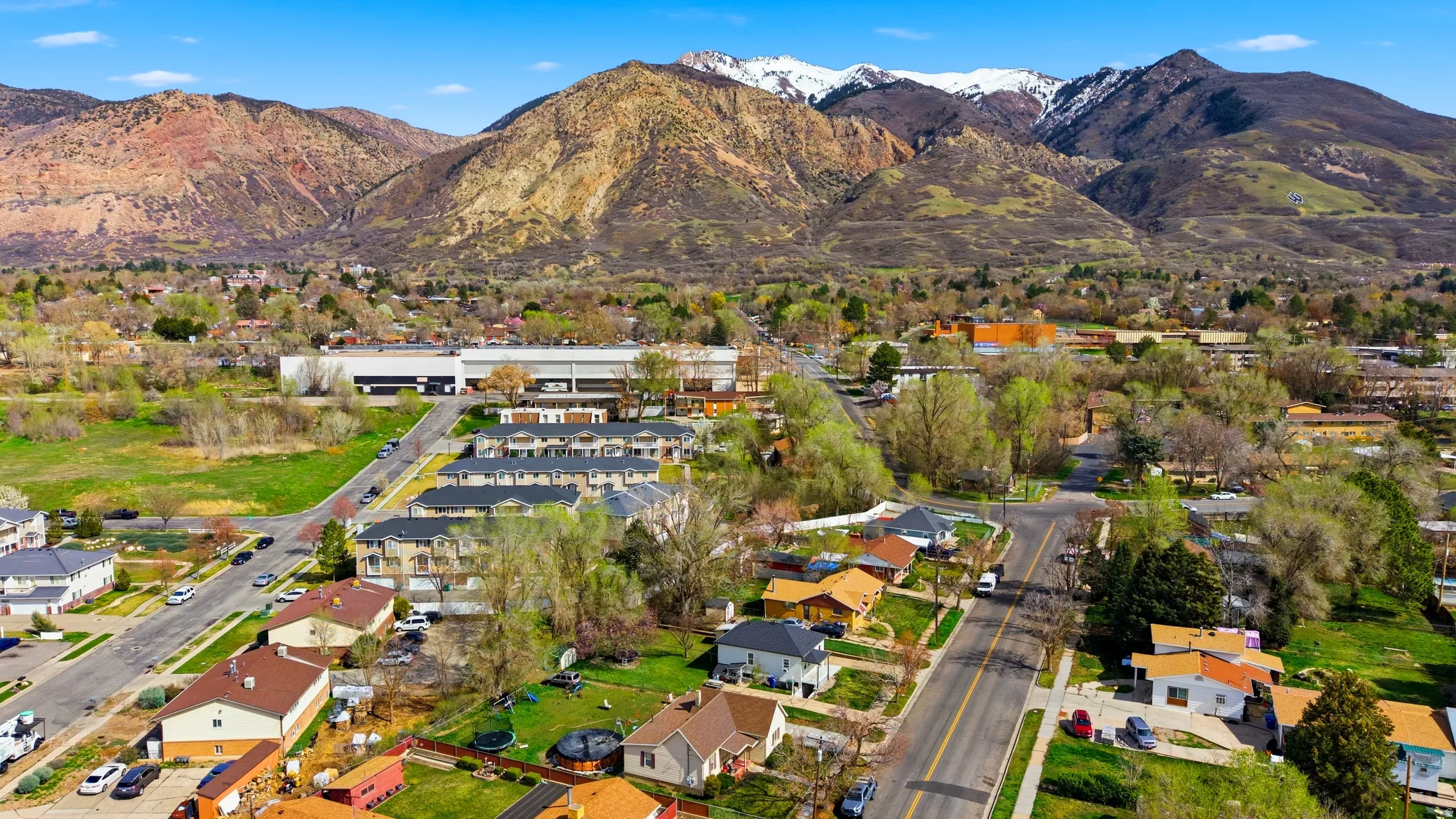 Aerial view of residential area with mountains