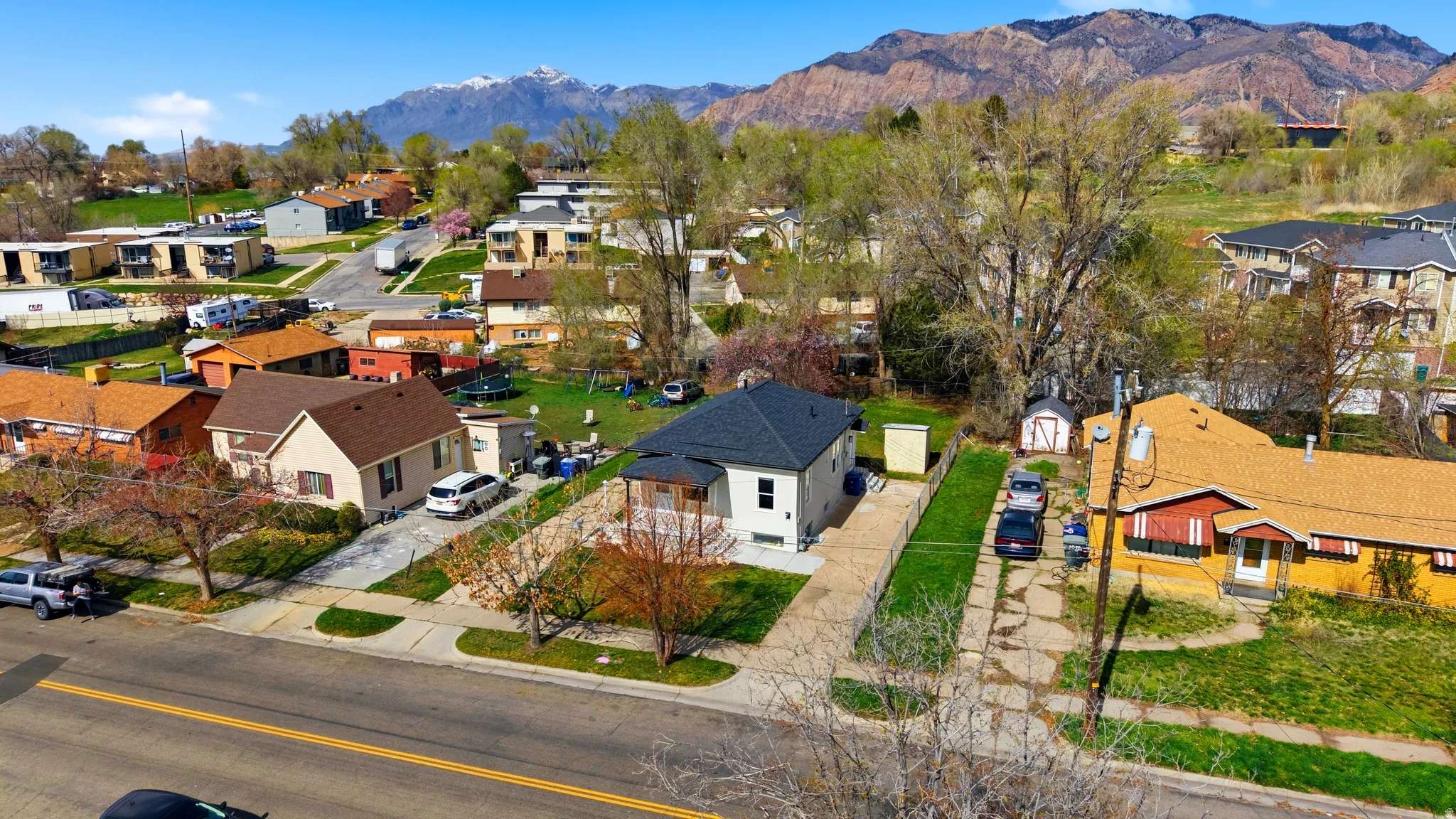 Aerial perspective of suburban area featuring mountains