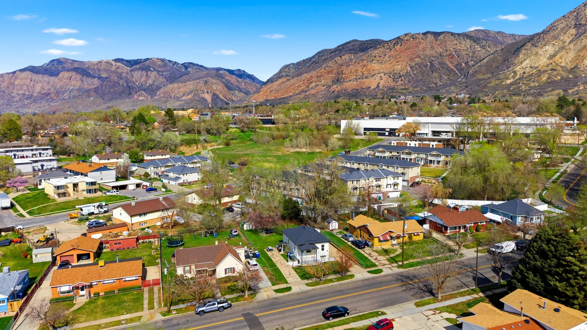 Aerial view of residential area with mountains