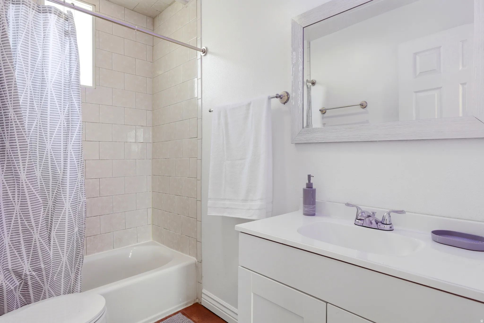 Full bath with vanity and shower / bathtub combination with curtain