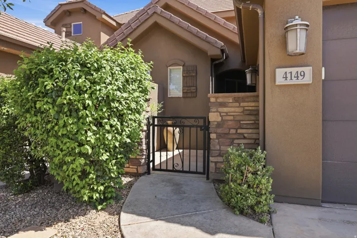 Entry courtyard with decorative wrought iron gate