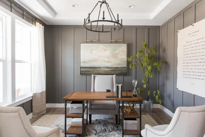 Room featuring board and batten wall treatment, wood-finish flooring, and recessed ceiling lighting
