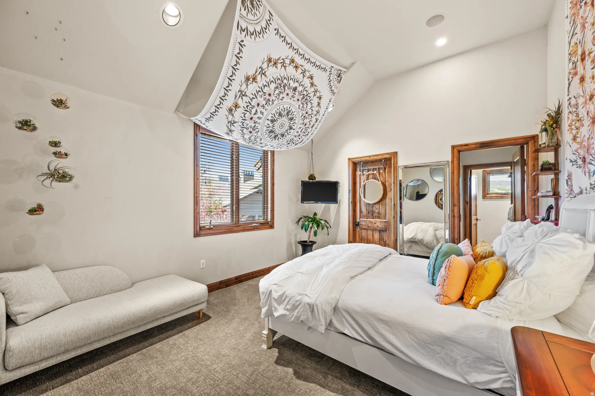 Bedroom with carpet, lofted ceiling, and recessed lighting