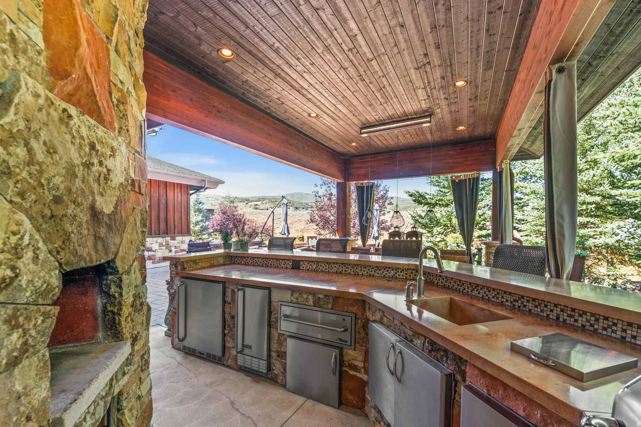 View of patio / terrace featuring an outdoor kitchen