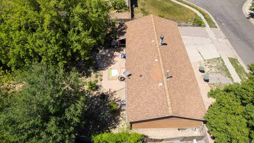 Gable roof with asphalt shingles and multiple roof vents