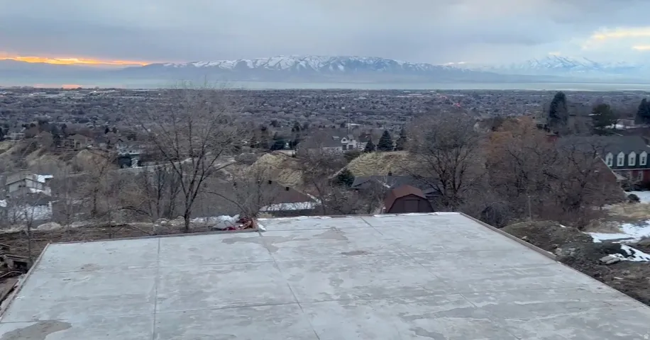 Concrete pad presenting a foundational base for construction