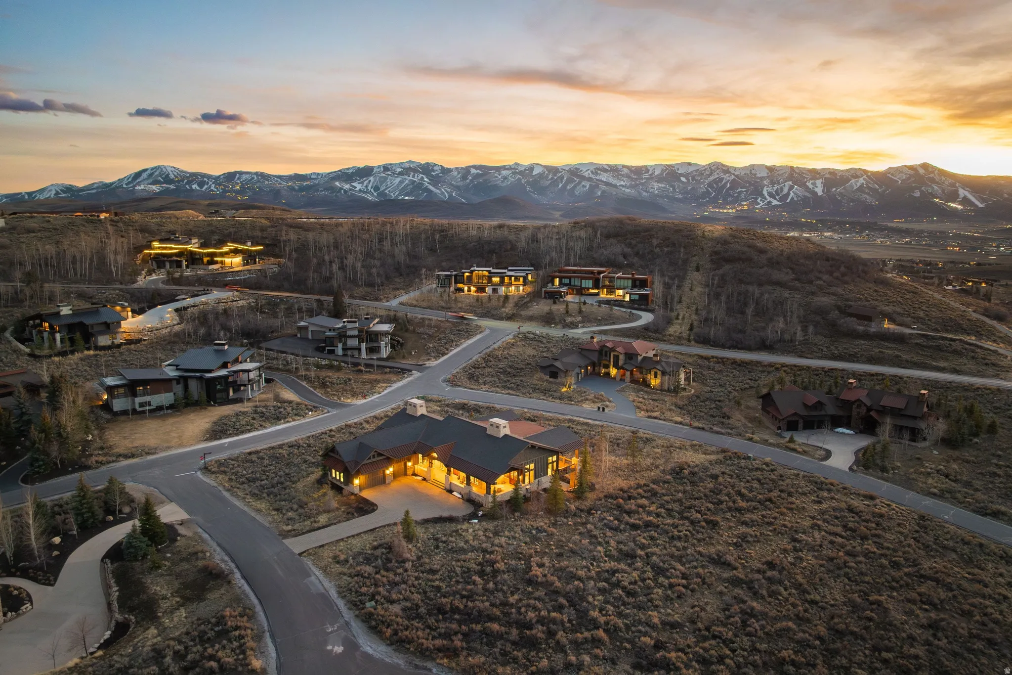 Hillside residential development featuring custom residences with distinctive architecture