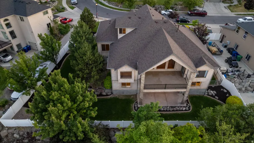 Spacious multi-level residence featuring a prominent gabled roofline and stone accents