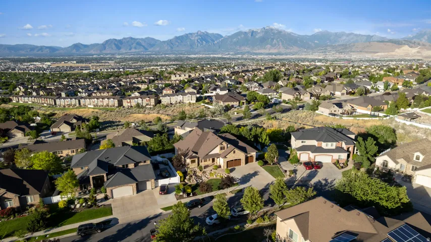 Established residential neighborhood featuring a variety of architectural styles, mature landscaping, and valley/mountain scenery