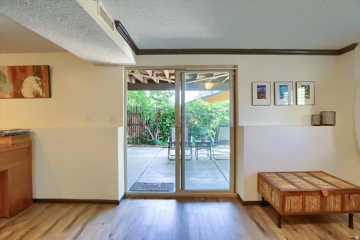 Sliding glass door opening to a concrete patio