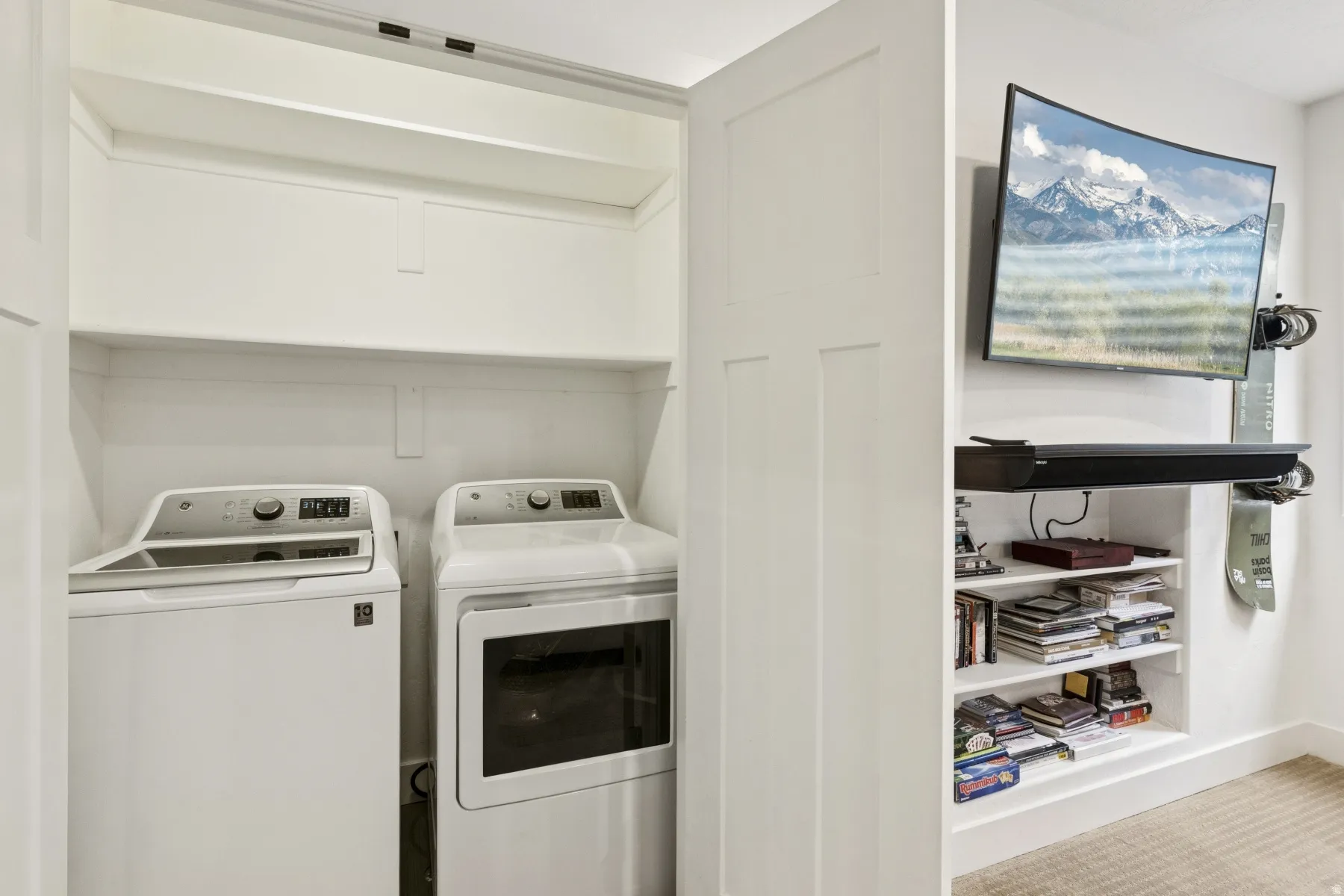 Laundry area with washer and clothes dryer