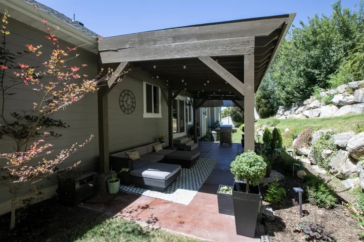 Covered patio featuring a stained concrete surface and a wood pergola
