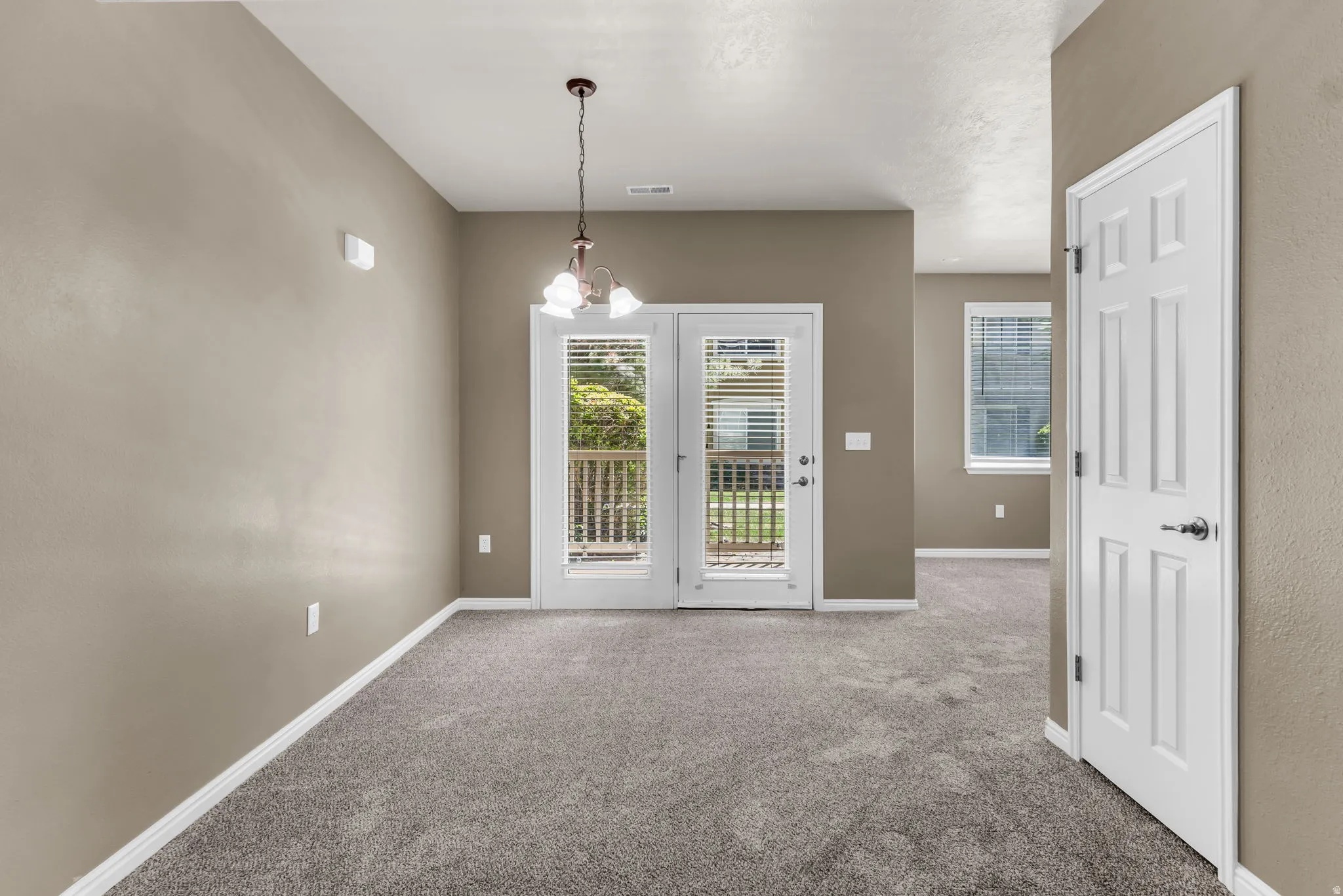 Open dining space seamlessly connected to kitchen and living areas.