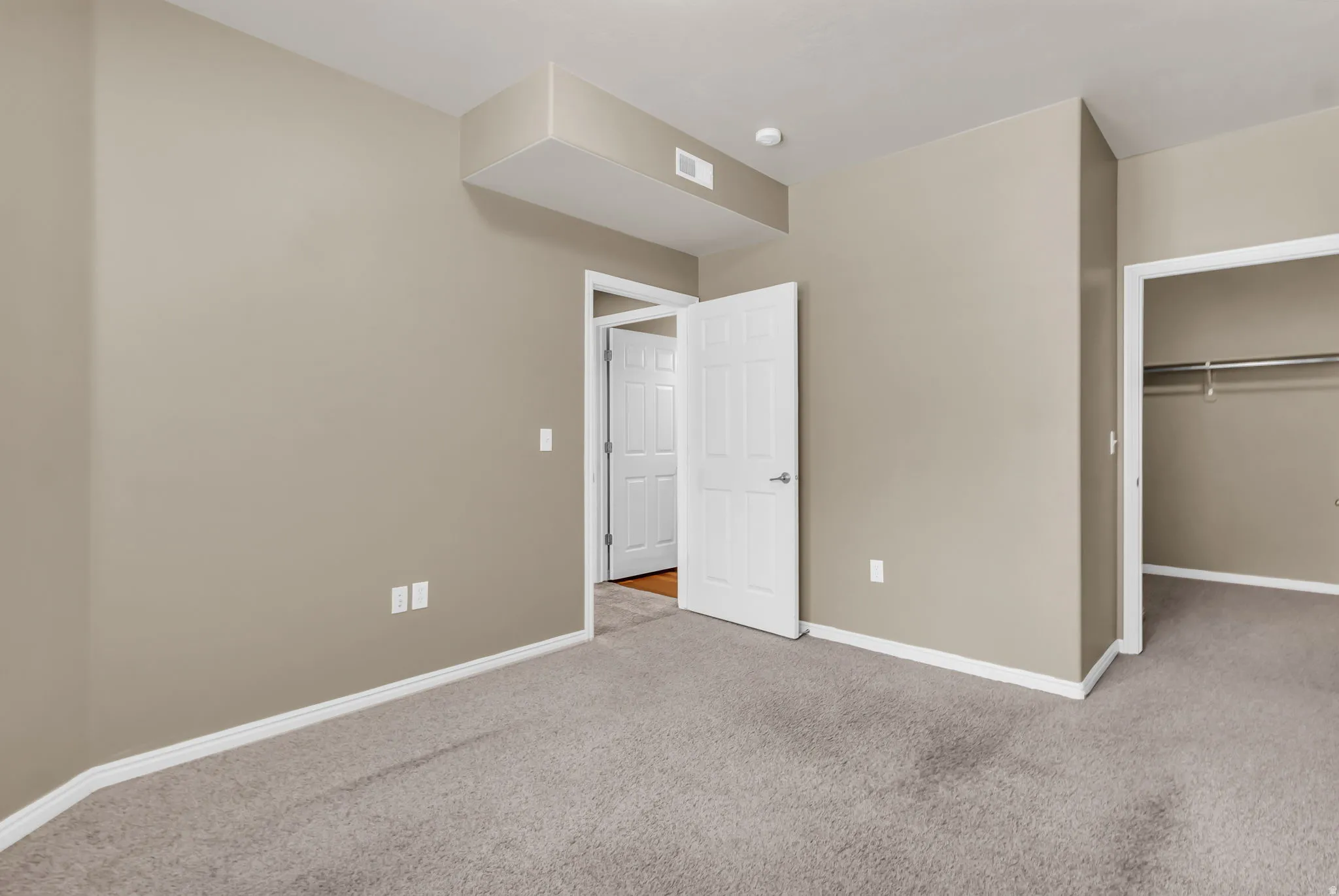 Well-sized secondary bedroom offering natural light and featuring a walk-in closet.