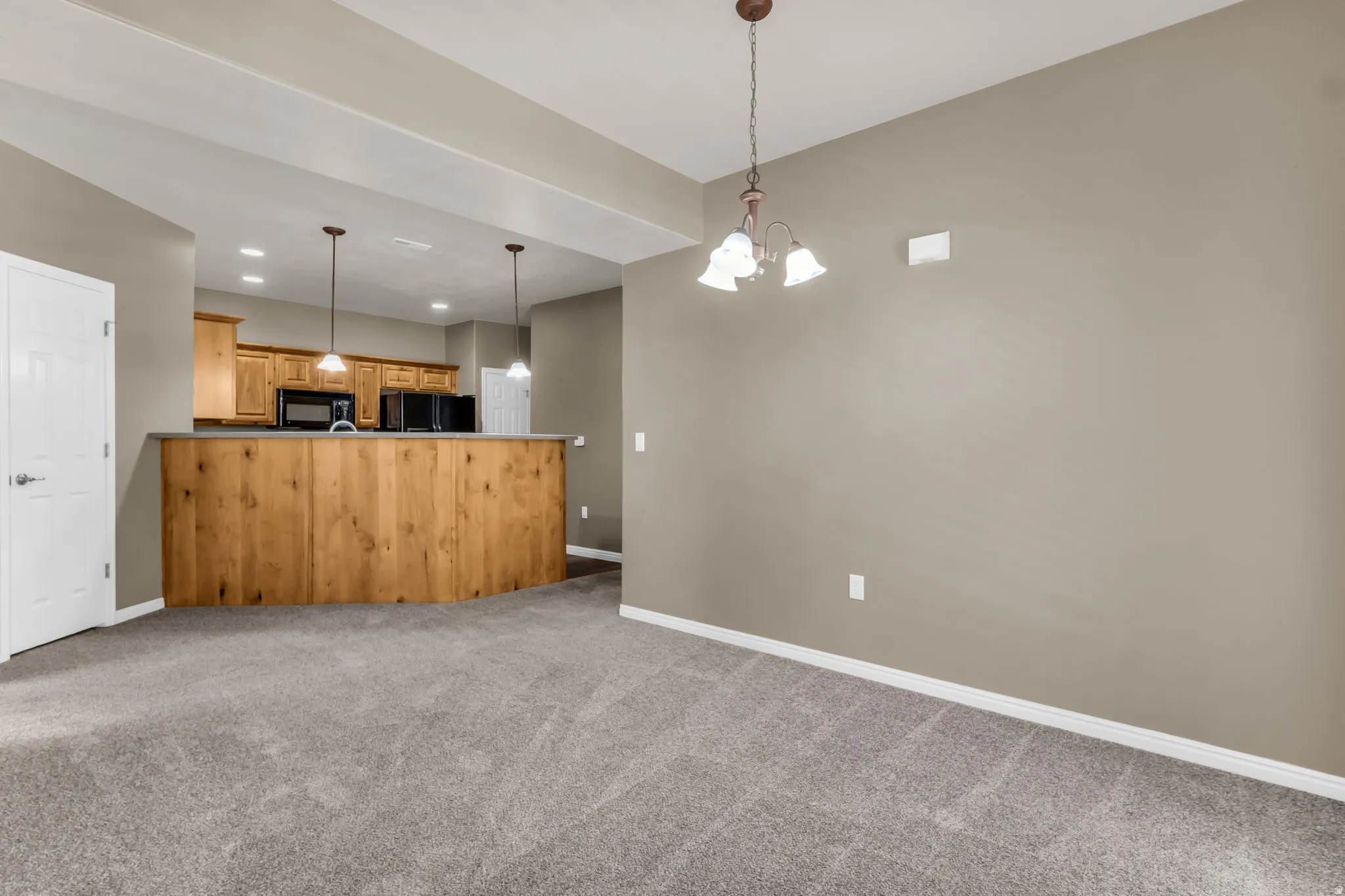 pen-concept great room seamlessly connected to the kitchen, creating an ideal space for everyday living and entertaining.