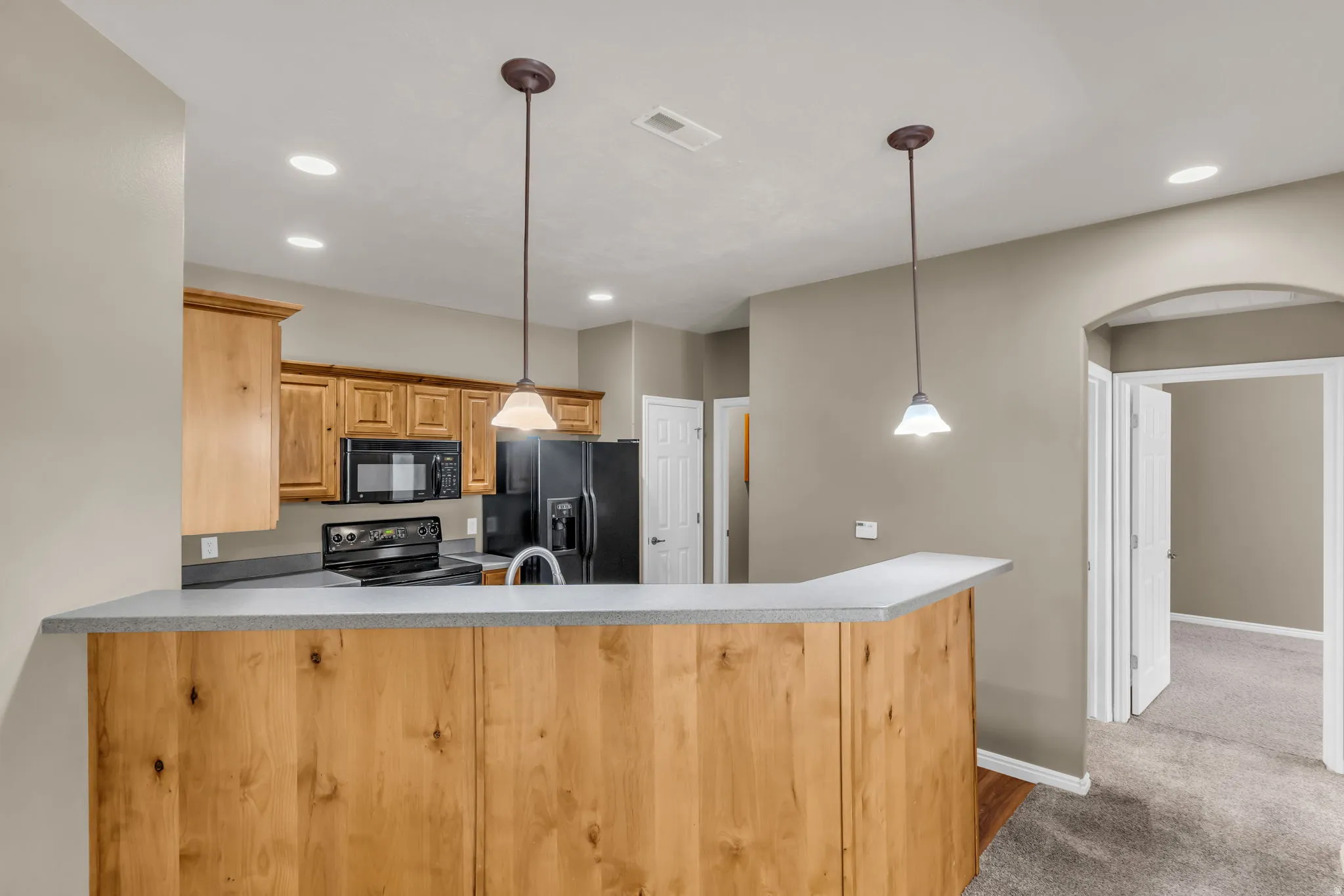 Functional kitchen with ample cabinetry, efficient layout, and great flow for everyday living.