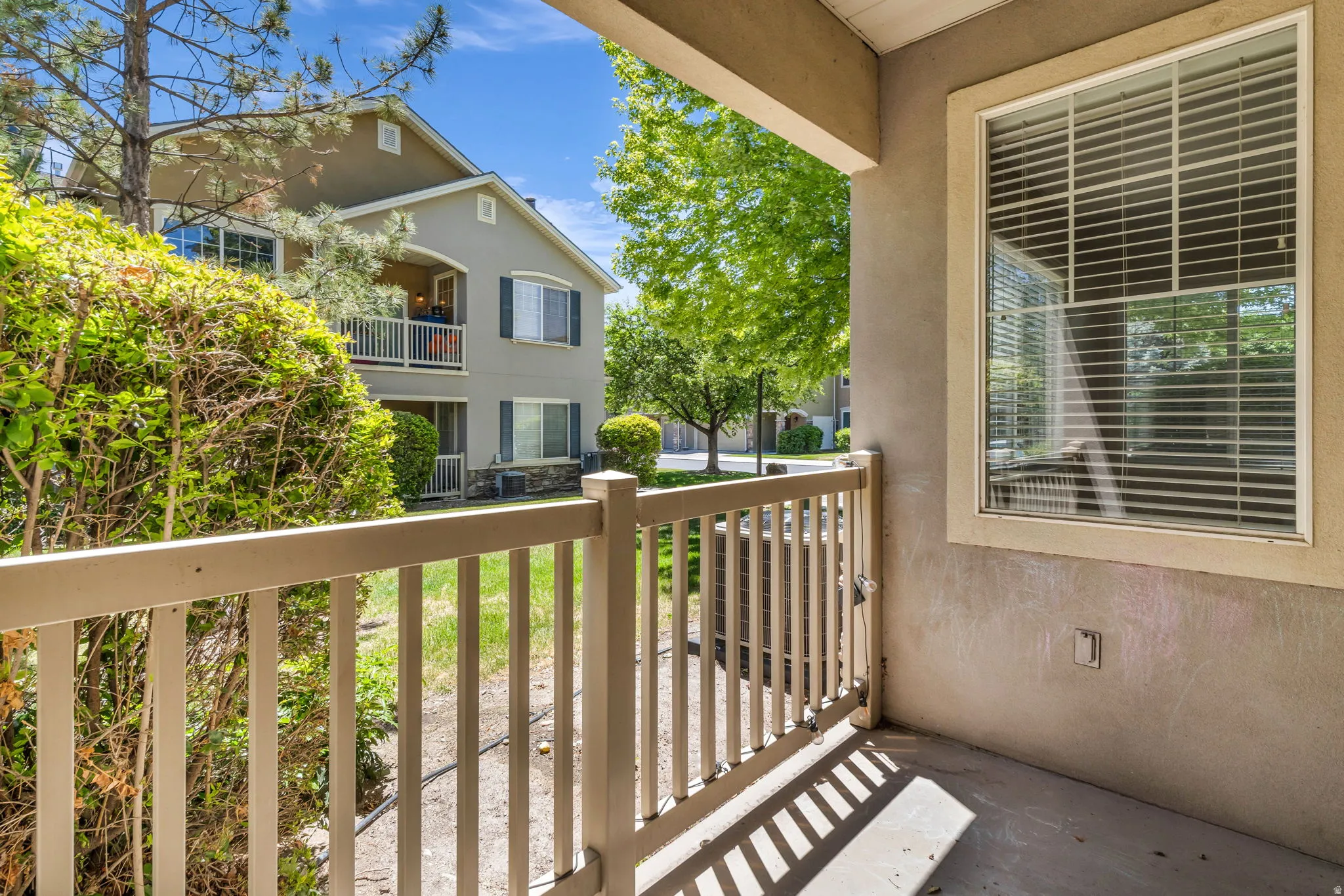 Private outdoor patio space ideal for relaxing, grilling, or enjoying low-maintenance outdoor living.
