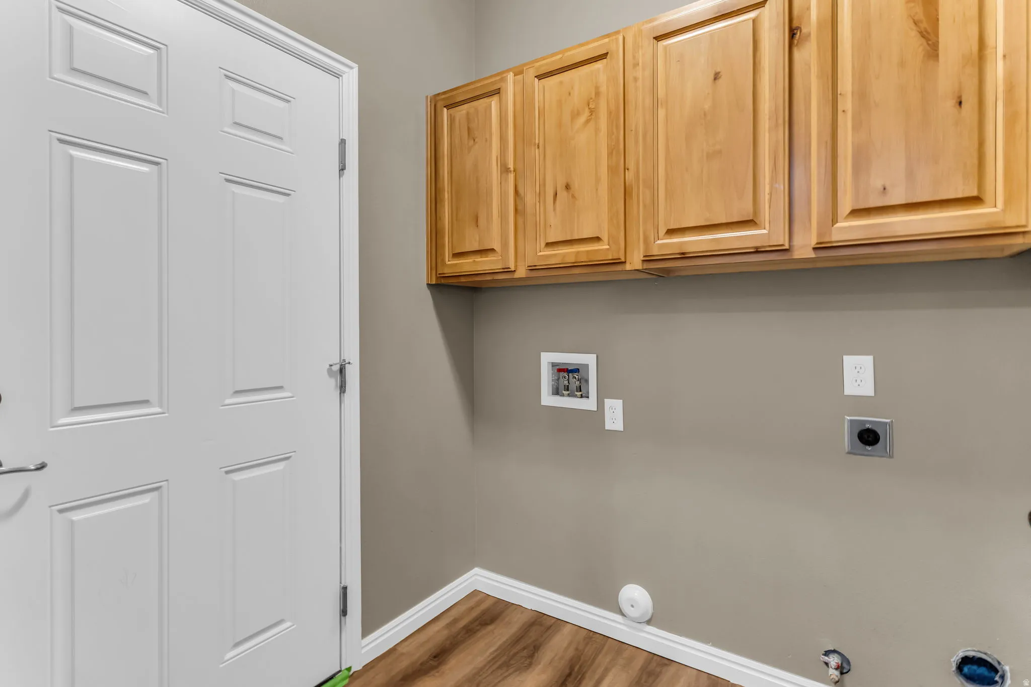Dedicated laundry space with practical layout and storage potential.