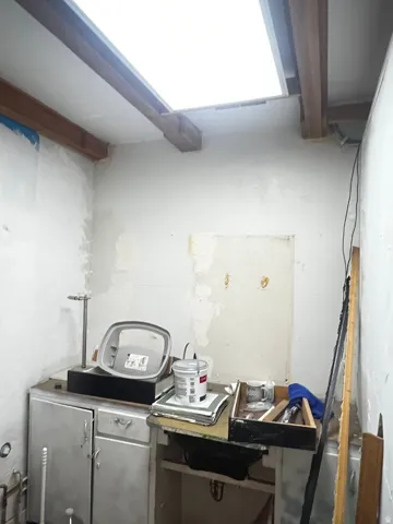 Skylight ceiling feature with exposed wood beams 2nd Bedroom