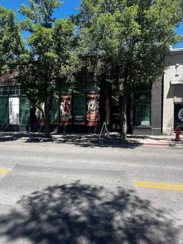 Commercial storefront featuring expansive display windows