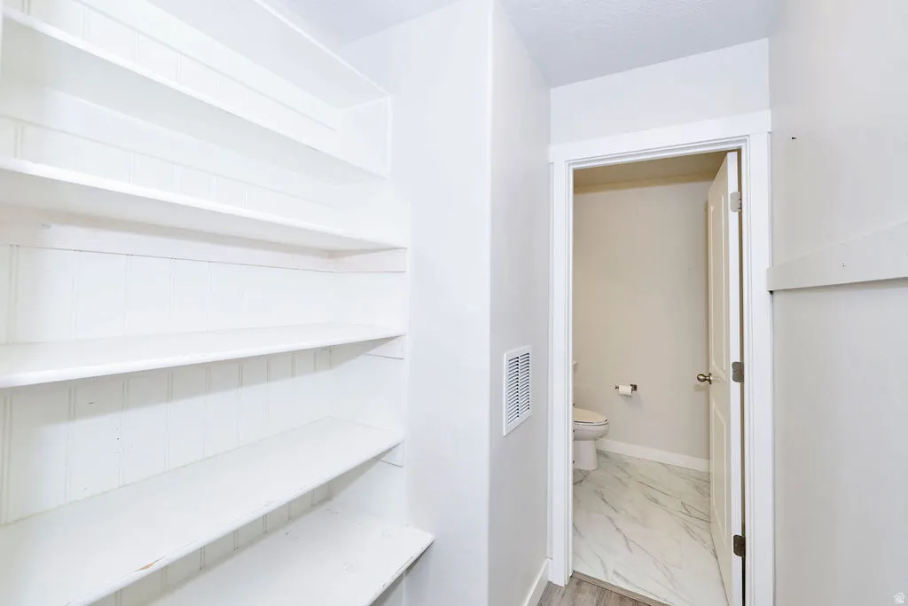 Built-in shelving with beadboard backing