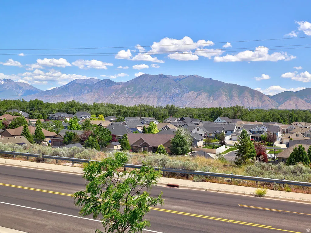 Residential neighborhood with a backdrop of distant mountains