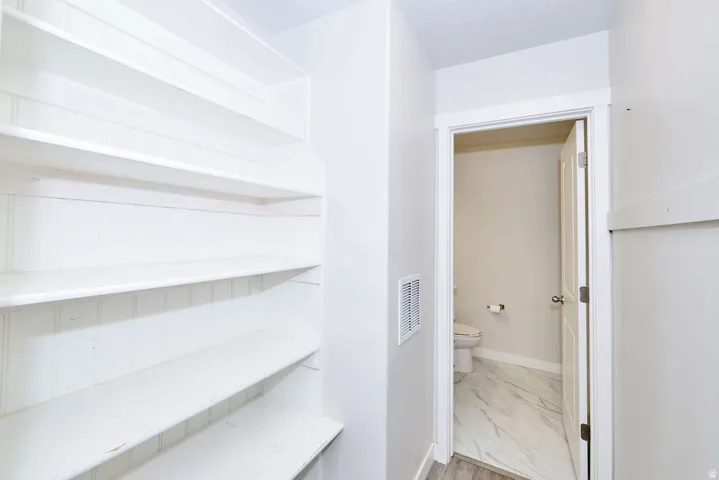 Built-in shelving with beadboard backing