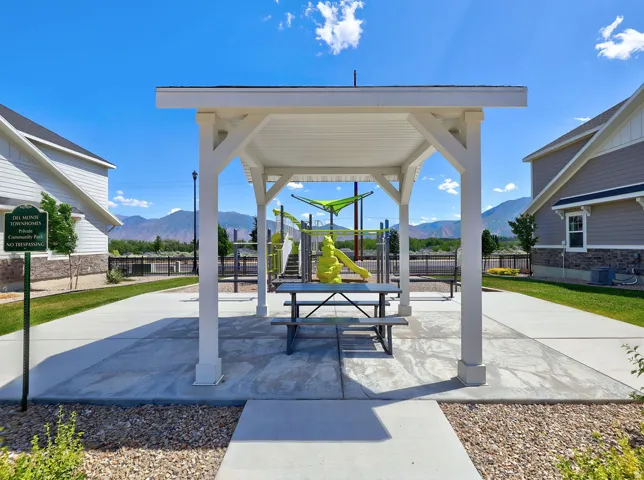 Open-air pergola with a concrete patio