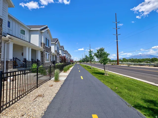 Row of contemporary townhomes featuring stone and siding exteriors